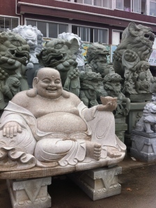 Stone buddha.  This is like a roadside stand of carved stone.  They aren't too worried about theft.